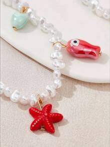 1 pieza Pequeño pez de cerámica, collar de perlas falsas con colgante de estrella de mar roja, adecuado para el uso diario de la mujer o para la playa