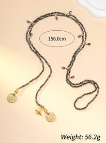 1 collier et 1 paire de boucles d'oreilles, collier de perles noir et doré moyen-oriental, ensemble de bijoux vintage en or ton, collier multicouche exotique, collier contrastant noir et doré, collier à pendentif rond sculpté. Le collier de perles noir et doré évoque le rythme mystique des clochettes de chameaux des nuits étoilées du désert moyen-oriental. Porter cet ensemble de bijoux est un identificateur unique d'une promenade dans un marché moyen-oriental.