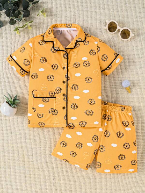 2 pièces/set Top à manches courtes avec col châle imprimé asymétrique et short assorti, pyjamas décontractés pour enfants de 3 à 7 ans