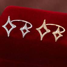 1 pieza Anillo con estrella de cuatro puntas ajustable y circonita cúbica de moda para mujer