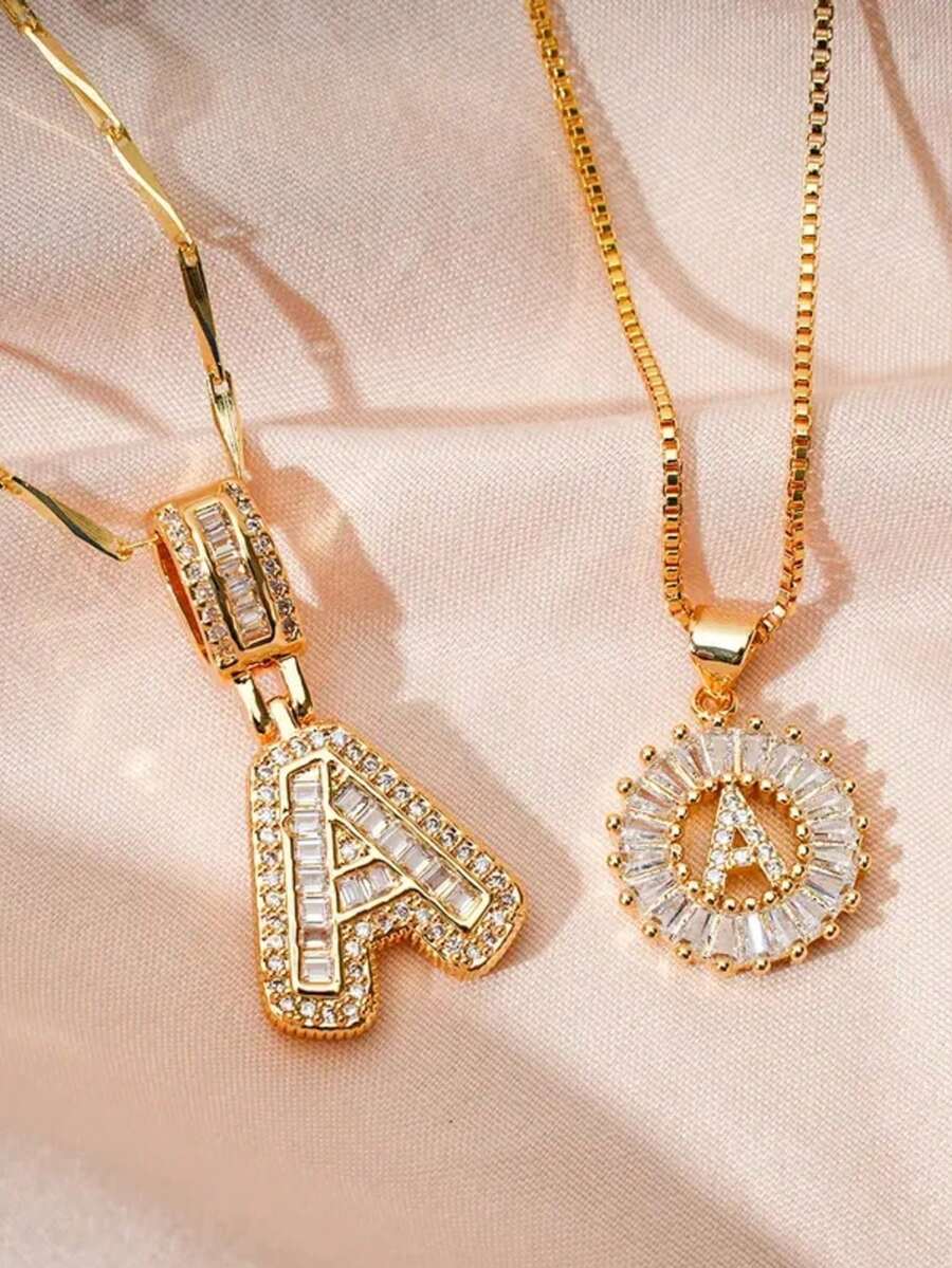 MEIITRUE Paquete de 2 collares con colgante de letra inicial para mujeres, collar con alfabeto enchapado en oro de 14 quilates con cadena ajustable de 17"-19", joya de moda como regalo para mujeres y niñas - Dorado - Ver 1
