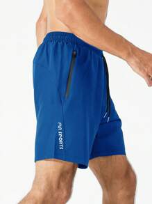 Sport Men Letter Graphic Zipper Pocket Sports Stretchy Shorts