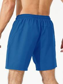 Sport Men Letter Graphic Zipper Pocket Sports Stretchy Shorts