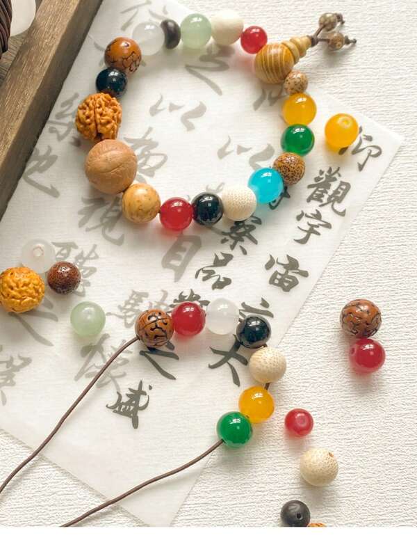 Un paquete de material y pulsera de cuentas bodhi de copia