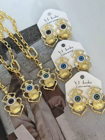1 set Punk Niche koperen oogvormige ketting en oorbellen, geschikt voor vrouwen, feestjes en dagelijks gebruik