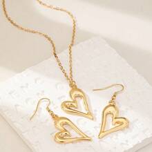1 Set de joyería con collar y pendientes con diseño minimalista de corazón de metal, adecuado para uso diario de mujer