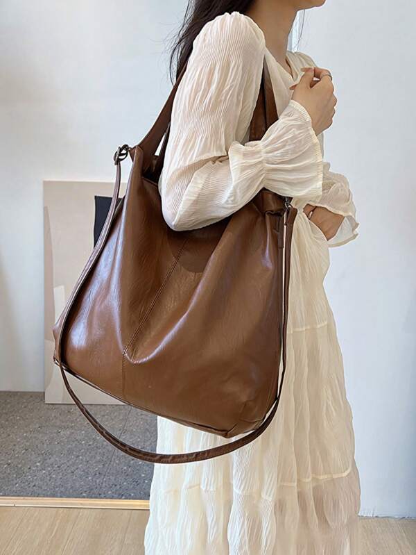 Nouveau sac pour femmes en PU, souple avec grande capacité. Sac à bandoulière croisé rétro et décontracté. Convient pour le shopping, le portefeuille, les jeunes femmes, les étudiants, les nouveaux arrivants, les cols blancs. Très adapté pour le bureau, l'université, le travail, les affaires, les déplacements, les activités de plein air, les voyages et les sorties.