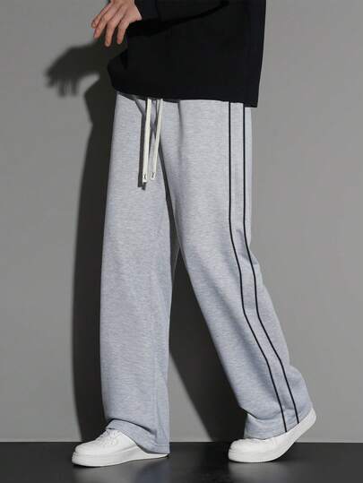 1 件男士抽绳腰宽松阔腿休闲运动裤，春夏