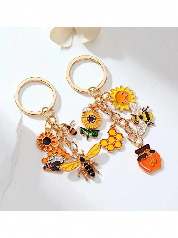 1 Stück Emaille Sonnenblumen Biene Schlüsselanhänger - Legierung Schmuck Accessoire mit Wabenmuster, Bienenstock und Bienen Motiv, lebendiges gelb/orange/grünes Design, feine Verarbeitung Damen Taschenbaumler, Geburtstagsgeschenk Souvenir, Sonnenblumen Schmuck, modischer Schlüsselorganizer, verspieltes Accessoire, farbige Emaille Abzeichen, Anhänger, Bienenstock Dekoration, Geschenk für Einkaufsliebhaber Rucksack für die Schule