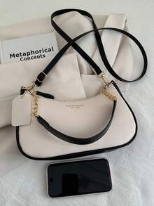 这款纯色PU皮革时尚腋下包简约时尚，容量大。它可用作单肩包、商务通勤斜挎包或日常办公手提包。适合女生、女大学生、职场新人及白领人士。用途广泛，适用于办公室、大学、工作、商务、通勤、户外活动、旅行和郊游等场合。 - 白色 - 查看 4