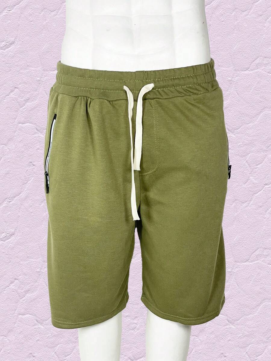 Short casual y deportivo para hombre, talle de cintura natural con cordón y ajuste de pierna suelto, bolsillos funcionales con cierre para mayor seguridad, tela de poliéster y elastano, apto para temporadas de primavera y verano, muy fresco y cómodo, ideal para hacer deporte o el uso casual. - Verde - Ver 1