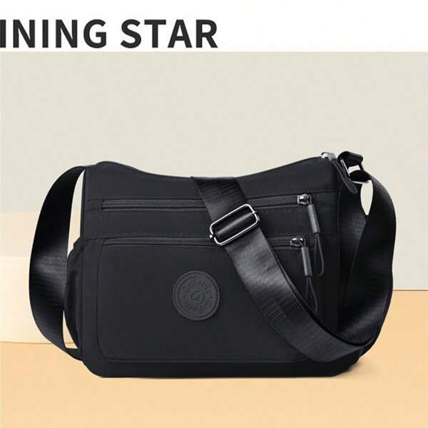 Esta bolsa cruzada de hombro ligera de nailon cuenta con múltiples compartimentos, correas de hombro ajustables, cremalleras de unicolor, almacenamiento antirrobo y es adecuada para uso diario y casual. Está forrada con poliéster para mayor durabilidad.