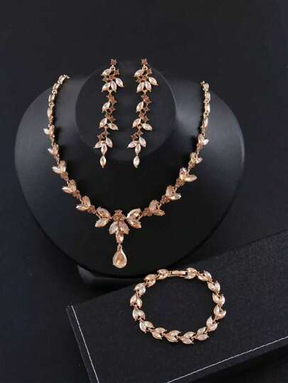 Conjunto de joyería nupcial y de dama de honor de 4 piezas con rhinestones, compuesto por un elegante collar de hojas con ojo de caballo en forma de punta, pendientes y pulsera, adecuado como accesorio para mujeres en una boda o fiesta