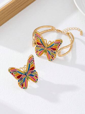 Ensemble de bijoux de mode vintage design en émail coloré avec décorations de papillons, comprenant un pendentif, un bracelet, une bague, des boucles d'oreilles et un brassard. Convient pour le port pendant les vacances à la plage des femmes. Excellent choix de cadeau pour les festivals.