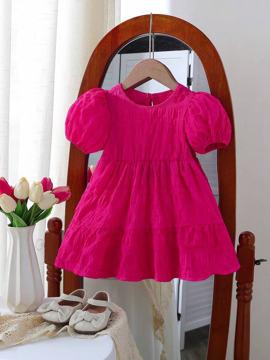 女婴可爱纯色圆领泡泡袖A字公主裙，优雅舒适，适合圣诞节、春夏、休闲穿着和外出活动。