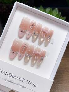 10 片纯手工制作的可穿戴指甲，具有长椭圆形指甲形状，粉色法式猫眼重工镶嵌钻石手绘指甲，指甲按压指甲指甲用品夏季指甲按压指甲片手工按压指甲春季指甲按压 Y2k 指甲短按压指甲假指甲指甲片手工指甲高气质简约设计指甲，