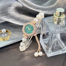 1 件女士优雅白色珠饰闪亮钻石点缀精致珍珠母贝纹理表盘石英时尚腕表