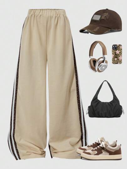 时尚休闲女童运动套装，采用阔腿豹纹拼接条纹运动裤，适合春、夏、秋季穿着。