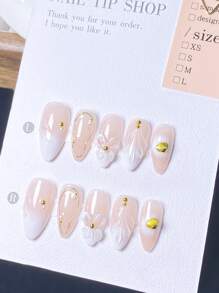 10 piezas de uñas postizas con forma de almendra decoradas con polvo de espejo dorado francés, olas de agua azules, espirales azules y amarillas, y cristales, adecuadas para cualquier ocasión, de rápida colocación, para mujeres y niñas, de moda lujosa y exquisita de alta gama y desmontables
