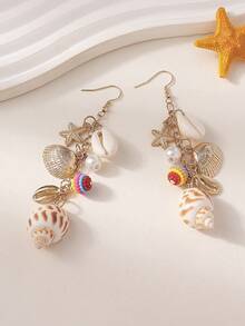 1 对航海风格天然贝壳金属海星串珠链流苏耳环，适合女性波西米亚风海滩度假休闲装。天然贝壳和贝壳的尺寸、形状和颜色略有不同