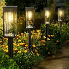 Set Of 8 Solar Lawn Lights With IP44 Splash-Proof Rating. 1400 MA,They Come With LED Courtyard Ground Plugs And Feature A Vintage Design. Suitable For Paths, Gardens, Villas, Landscapes, Lawns, Sidewalks And Terraces.