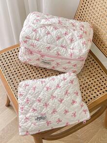 1 szt. Różowa pikowana kosmetyczka z kokardką, swobodna, duża, przenośna kosmetyczka z zamkiem błyskawicznym, niezbędna w podróży i na wakacjach, pomieści podpaski higieniczne, słuchawki, ładowarki, szminki, kosmetyki, perfumy, produkty do pielęgnacji skóry, wystrój domu - Różowy - Zobacz 5