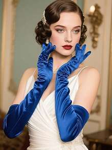 Un par de guantes largos de ópera, elaborados en satén y que se remontan a la década de 1920, sirven como accesorios elegantes para eventos de disfraces, vestimenta formal de noche y fiestas temáticas, incluidos los encuentros de juego de roles y las celebraciones de bodas. Halloween