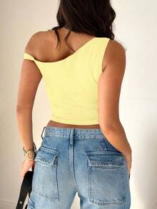 Femme Blouse décontractée simple à épaule asymétrique et manches courtes