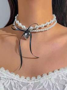 1 chiếc vòng cổ nữ kiểu Pháp, mặt dây chuyền hình trái tim và nơ hai lớp đính ngọc trai, vòng cổ choker thời trang thanh lịch. - Dây chuyền hai lớp - Xem 11