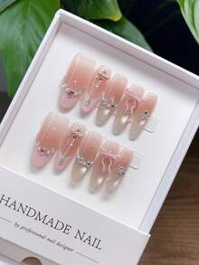 10 片纯手工制作的可穿戴指甲，具有长椭圆形指甲形状，粉色法式猫眼重工镶嵌钻石手绘指甲，指甲按压指甲指甲用品夏季指甲按压指甲片手工按压指甲春季指甲按压 Y2k 指甲短按压指甲假指甲指甲片手工指甲高气质简约设计指甲，