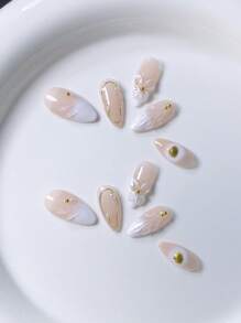 10 piezas de uñas postizas con forma de almendra decoradas con polvo de espejo dorado francés, olas de agua azules, espirales azules y amarillas, y cristales, adecuadas para cualquier ocasión, de rápida colocación, para mujeres y niñas, de moda lujosa y exquisita de alta gama y desmontables