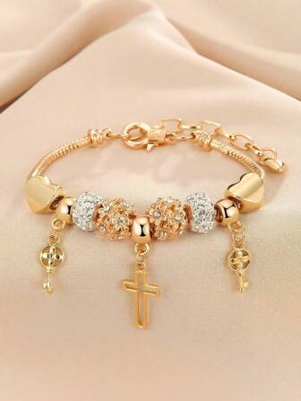1 stuk modieuze gouden kralenarmband in Europese en Amerikaanse stijl met hart-, kruis- en bloemenbedels, elegante handgemaakte sieraden voor vrouwen - delicaat uitgehold ontwerp, verstelbare lengte, perfect cadeau
