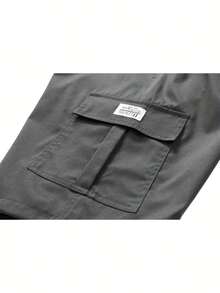 男士休闲工装短裤三件装 - 黑色、浅卡其色、灰色，宽松版型，多口袋设计，可调节抽绳腰带，涤纶材质 - 适合运动、户外和休闲穿着 | 跑步和训练短裤 | 纯色设计