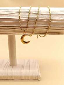 Un colgante de luna grande de acero inoxidable dorado, colgante de media luna, collar de joyería como regalo para uso diario de damas