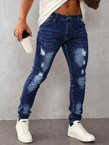 Pantalones vaqueros ajustados para hombre de color azul con detalles de roturas, tela transpirable y cómoda, ideales para estilos casuales urbanos - Azul lavado oscuro - Ver 1