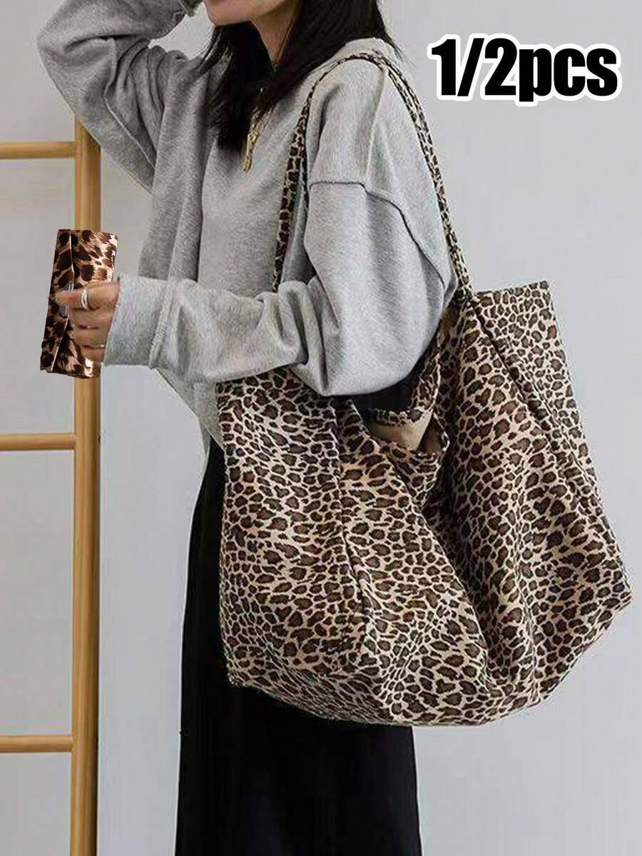 这款时尚大号豹纹手提包兼豹纹口红包、零钱包、指甲油便携收纳包，优雅便携，容量大，可作单肩包或腋下包使用，通勤必备。简约拉链零钱包，适合青少年、女性、大学生、白领等各种人群，是工作、返校、中学、高中、大学、海滩度假、生日礼物、返校礼物的理想之选。