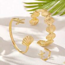 Set de 3 piezas con tema marino, brazalete y anillos abiertos con estrellas de mar y conchas