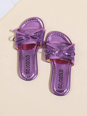 1 双可爱蝴蝶结设计时尚休闲女孩拖鞋，适合居家穿着和旅行摄影等各种场合，女孩的最爱