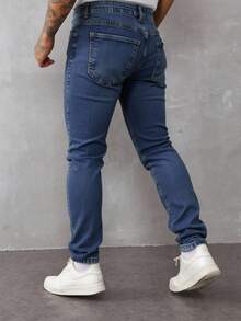 Pantalones vaqueros ajustados para hombre de color azul, estilo clásico y versátil, ideal para looks casuales y formales - Azul lavado medio - Ver 3