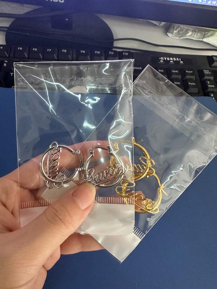 Gold G Earrings
