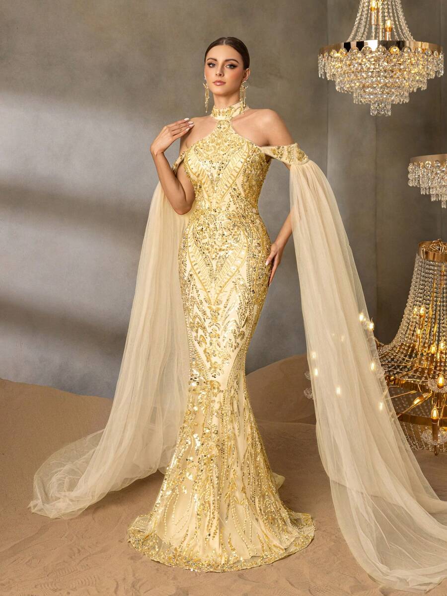 Faeriesty 带珠饰亮片的戏剧性斗篷袖挂脖美人鱼礼服 | 结构紧身胸衣及地晚礼服 - 金色 - 查看 1