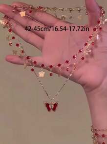 1 pieza Collar con forma de corazón rojo de lujo con perla falsa y diseño de cadena ósea de alta gama para mujeres