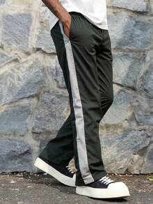男士休闲运动宽松户外裤，彩色拼布，拉链口袋，尼龙面料，适合户外休闲运动 - 黑色 - 查看 3