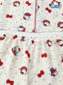 Sanrio 官方授权两件套女式迷你波点三丽鸥Hello Kitty长袖翻领纽扣口袋上衣和蝴蝶结裤子睡衣套装，适合居家穿着，春夏秋冬皆宜。