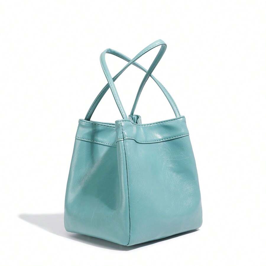 2025春夏新品银色镜面托特包女士午餐盒包银色手提迷你手提包优雅简约风格银色PU皮水桶包休闲轻便纯色手提小钱包镜面纹理午餐包