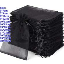 50/100 stuks geschenkverpakkingszakken, zwarte organza snoepzakken, serviesgoed, Halloween, kerst, huishoudelijke artikelen, feestartikelen voor bruiloften, festivalactiviteiten en feestbenodigdheden, geschenkverpakkingszakken, snoepzakken voor bruiloften, geschenkverpakkingszakken. Sieradenverpakking, organza zakjes, snoepzakken, reistassen, geschenkzakken voor de feestdagen, kan worden gebruikt voor fruit, anti-insectenzakken, herfst, kerstmis en Valentijnsdag.