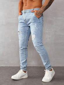 Pantalones vaqueros ajustados para hombre de color azul claro con roturas, estilo casual y trendy, perfectos para looks urbanos - Lavado ligero - Ver 2