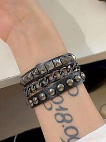 Xiacheng 1/3/4件套女士朋克摇滚手链套装 - 铆钉可调节人造革手镯，80年代Emo哥特机车风，男女皆宜的另类时尚