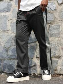 男士休闲运动宽松户外裤，彩色拼布，拉链口袋，尼龙面料，适合户外休闲运动 - 黑色 - 查看 5