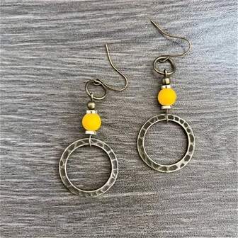 Pendientes con colgante de círculo hueco con decoración de turquesa falsa, joyería de fiesta para mujer